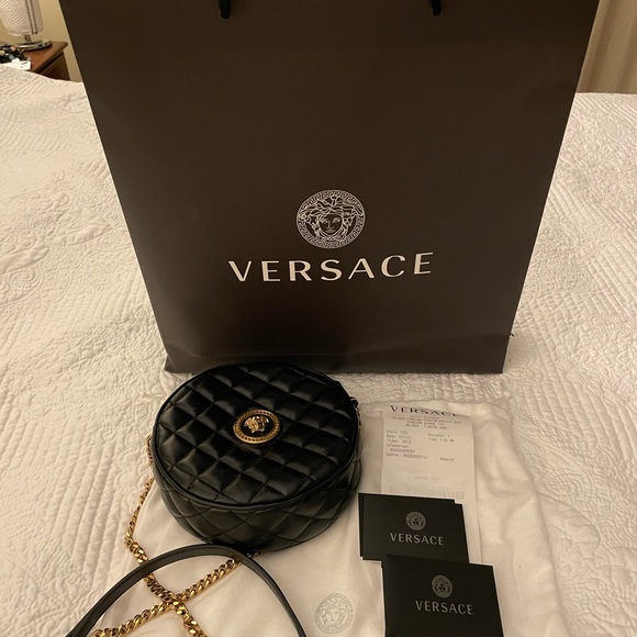 Versace Handbags - Versace black leather crossbody bag.